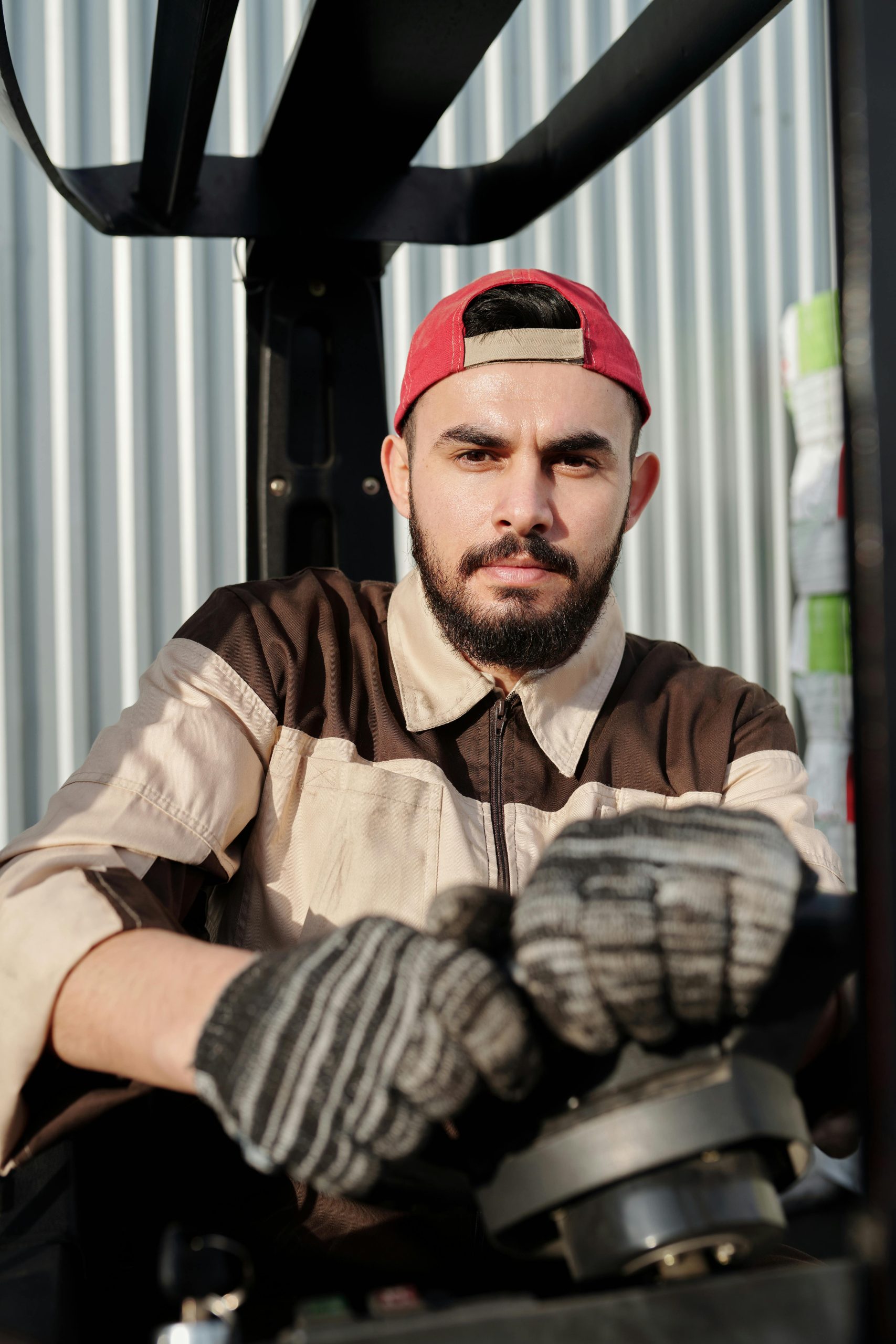 pexels-tiger-lily-4487450 Close up photo of man holding steering wheel